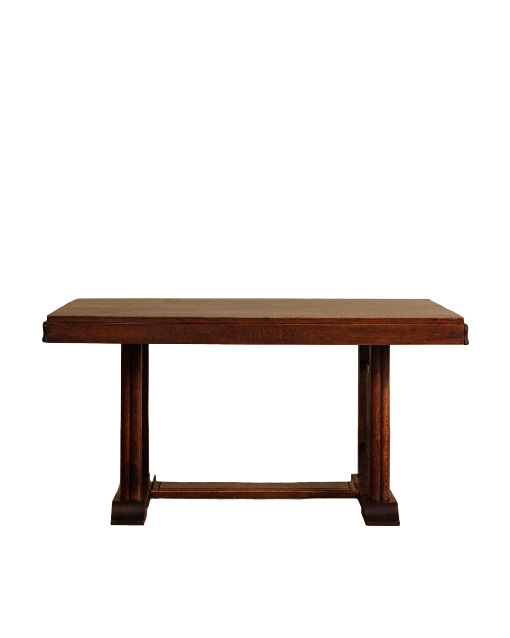 Wooden table against a beige wall