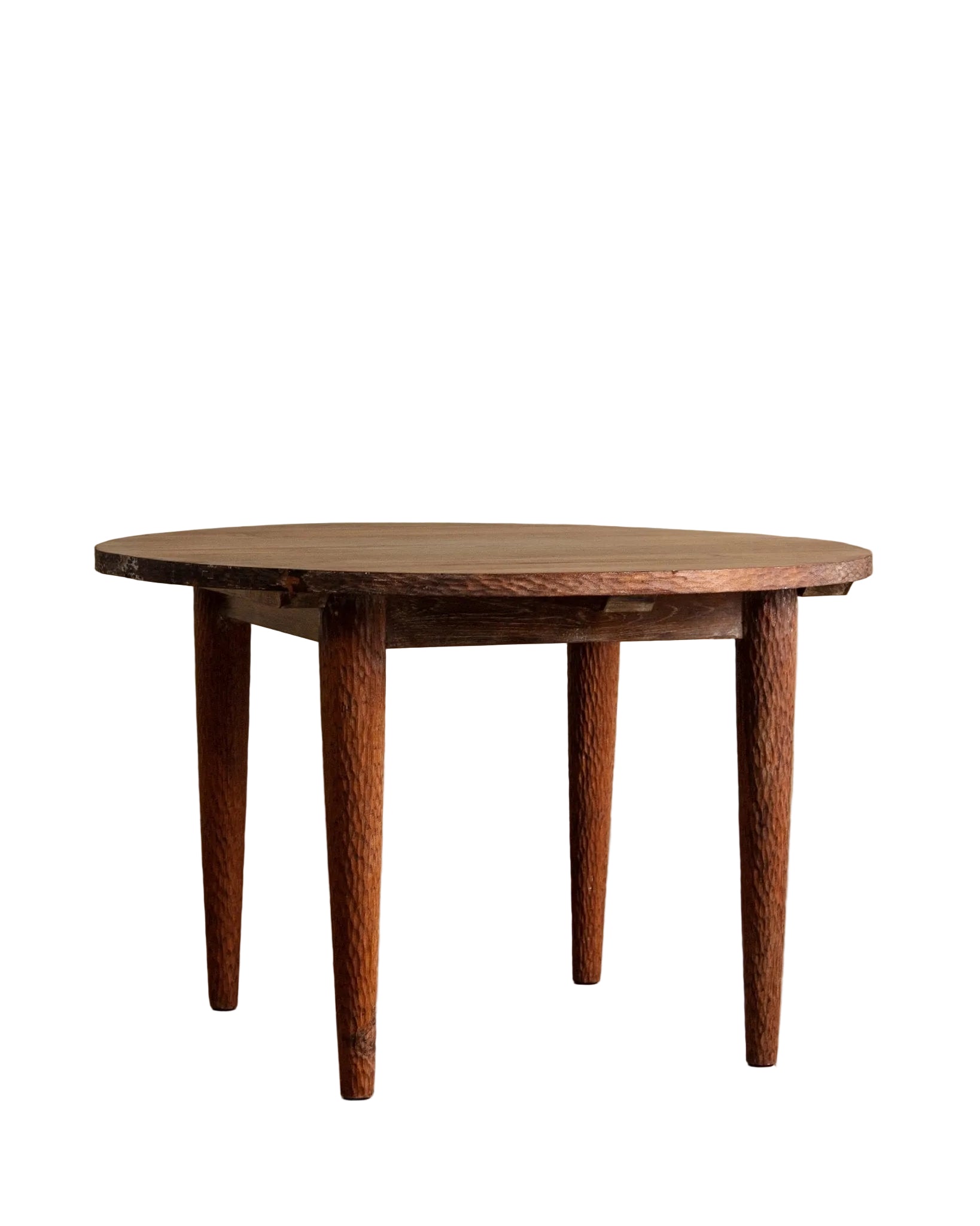 Round wooden table with a rustic design on a plain background