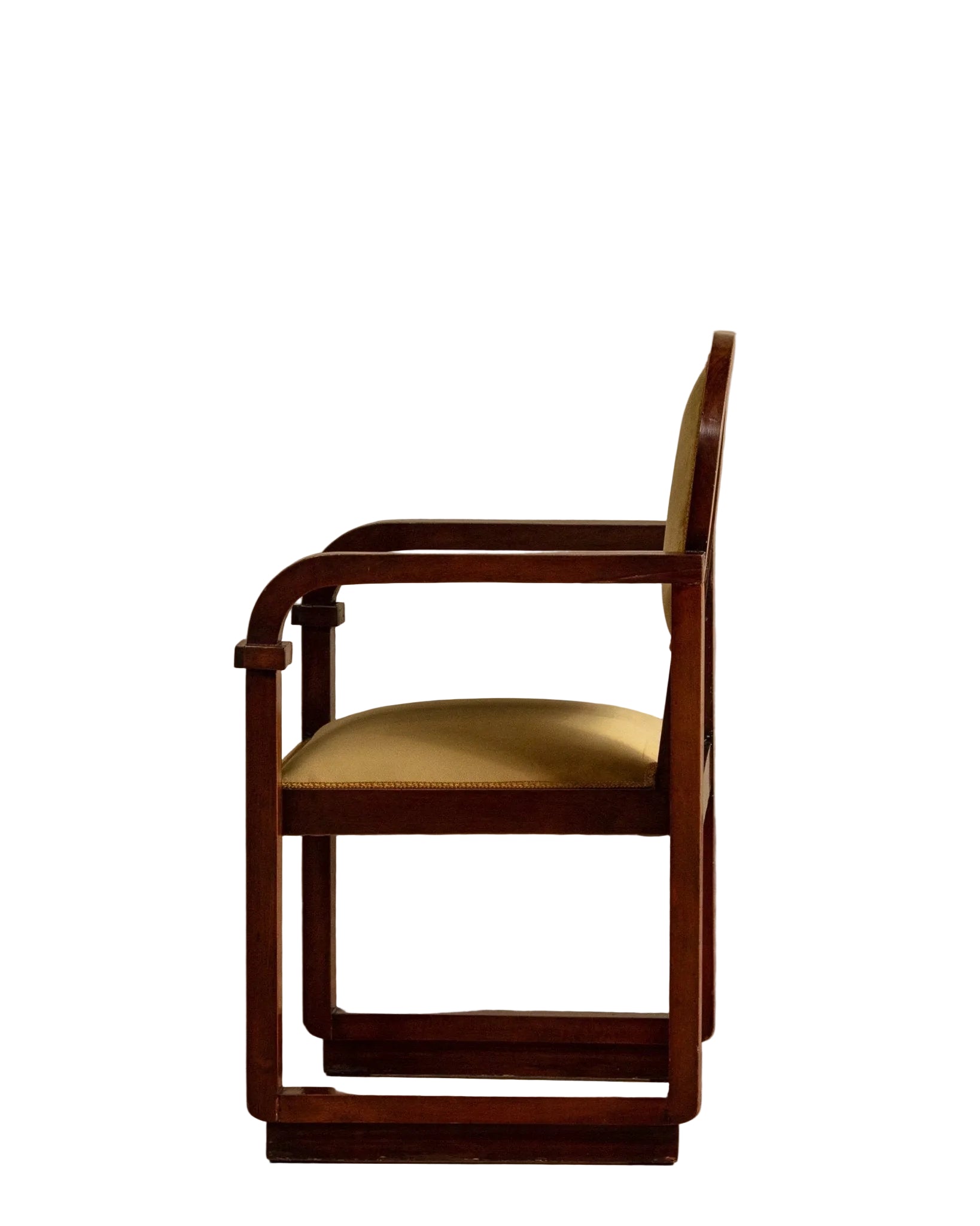 Wooden chair with a beige cushion on a wooden floor and beige wall background
