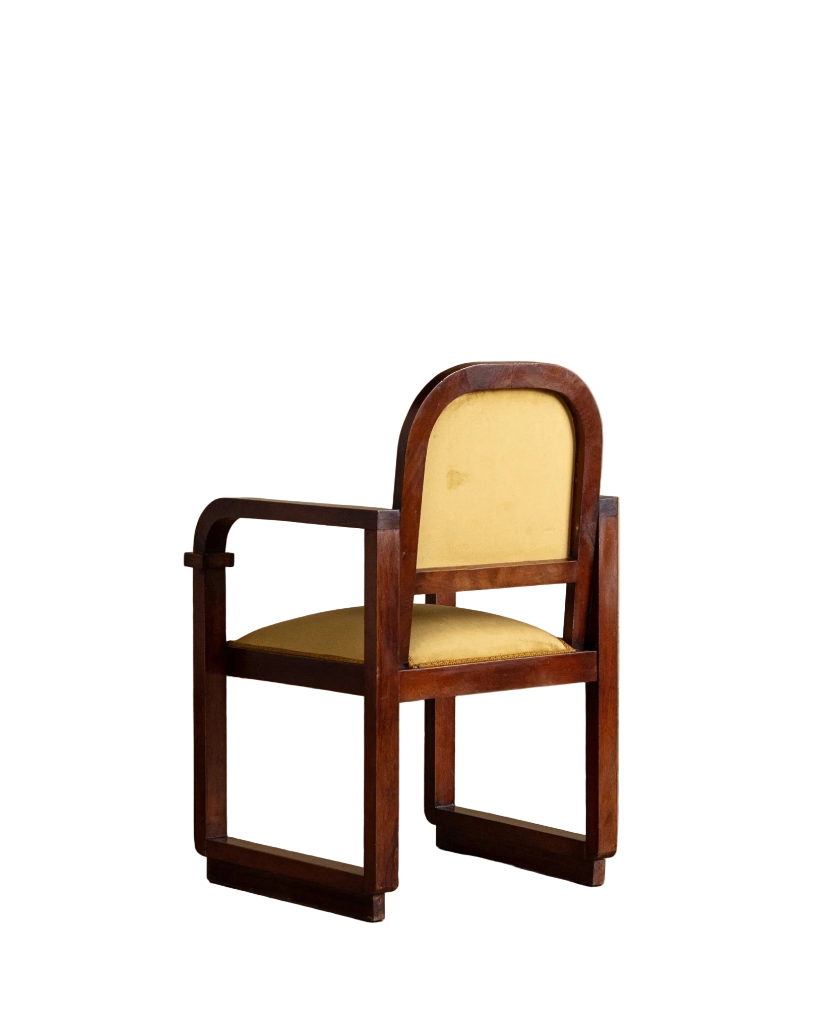 Wooden chair with beige cushion on a wooden floor and beige wall background
