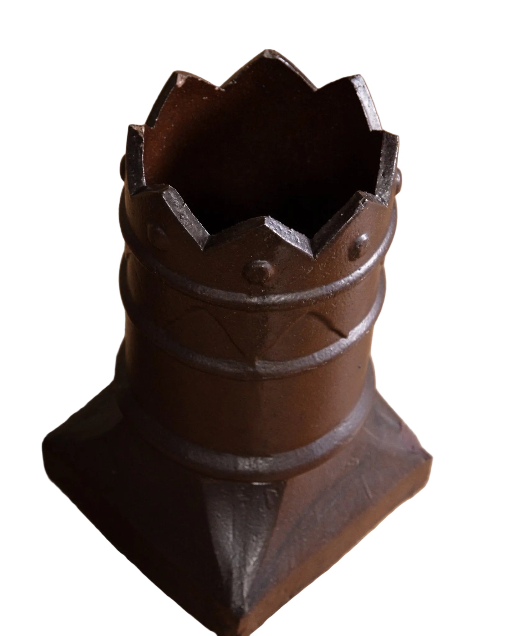 Decorative metal object on a wooden surface