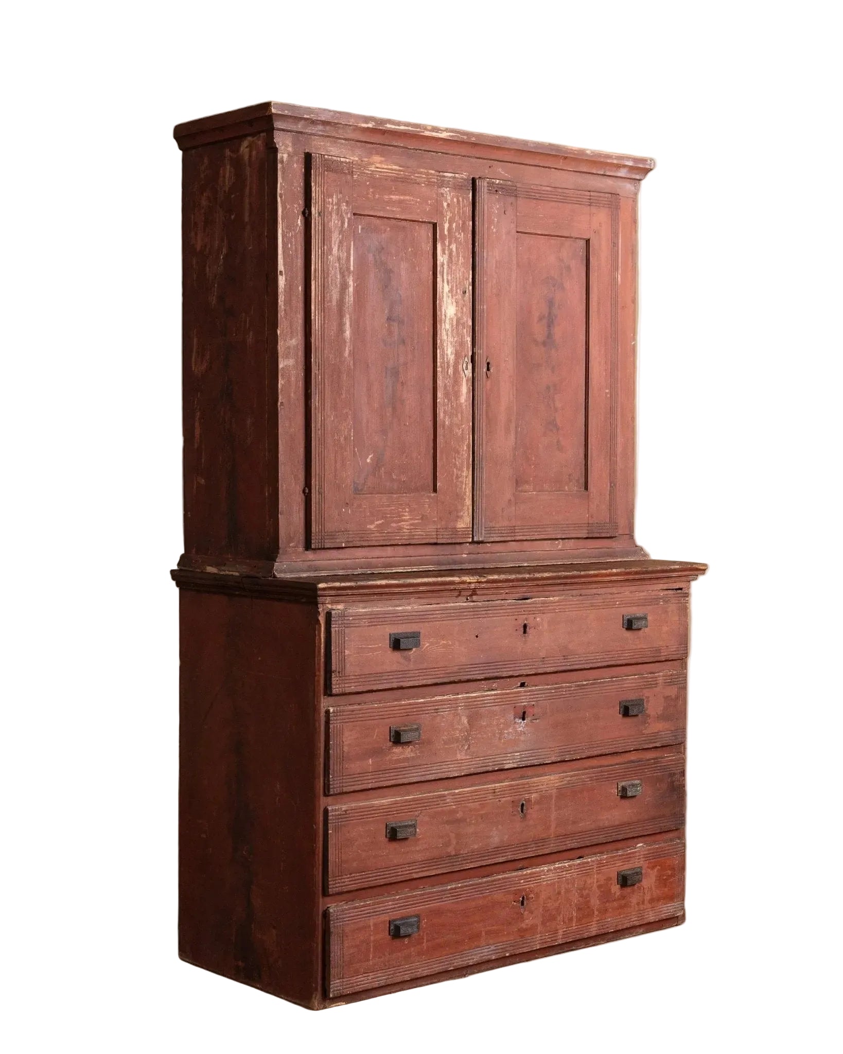 Vintage wooden cabinet with two doors and four drawers on a beige background